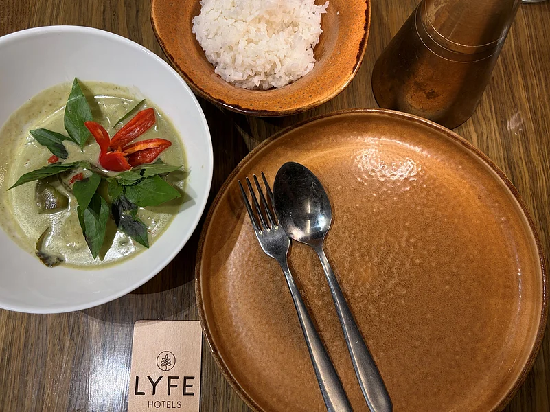 Thai green curry with jasmine rice at Sweet Basil