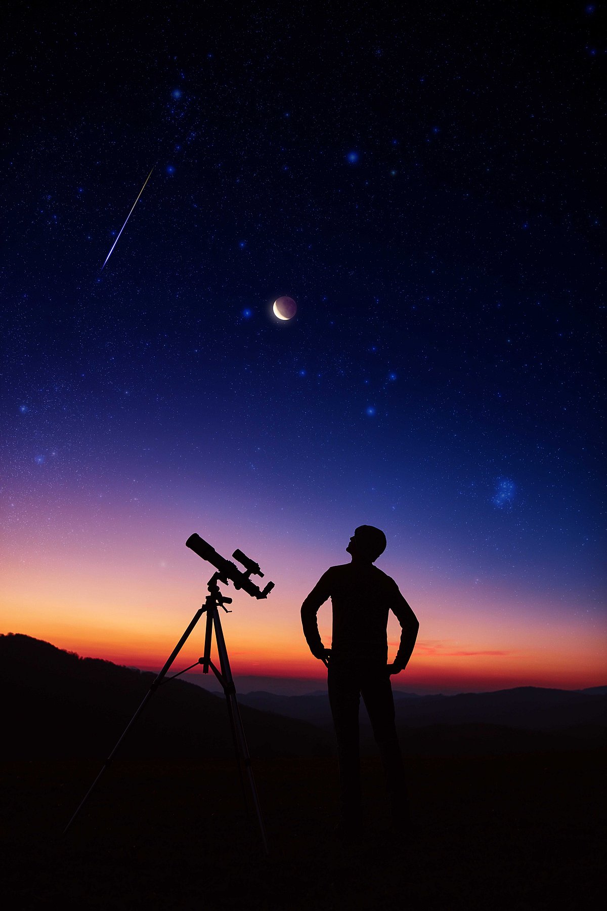Shutterstock : Man looking up at the night sky