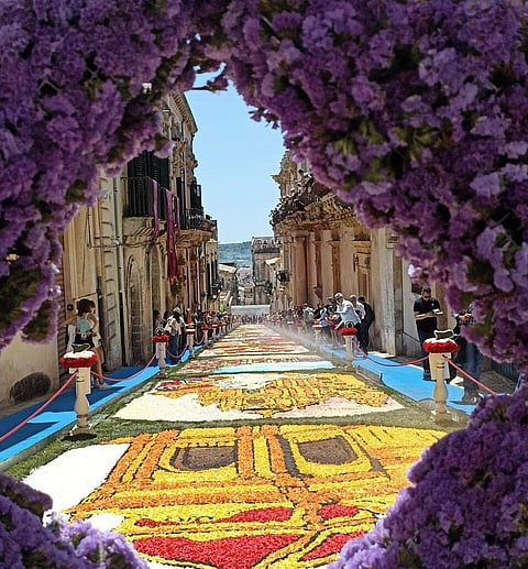 The Via Corrado Nicolaci is transformed each year into a long outdoor display of floral artwork