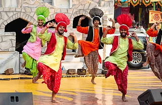 Shutterstock : A performance of Punjabi Bhangra dance