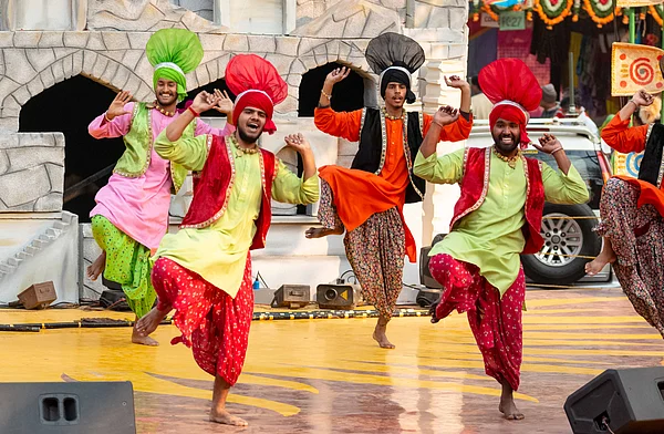 Shutterstock : A performance of Punjabi Bhangra dance