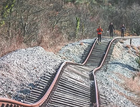 A short section of track has been dramatically warped by shifting ground and erosion