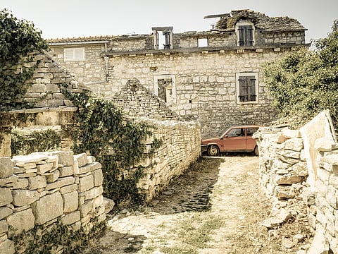Old limestone houses in Grohote on the island Šolta, Croatia