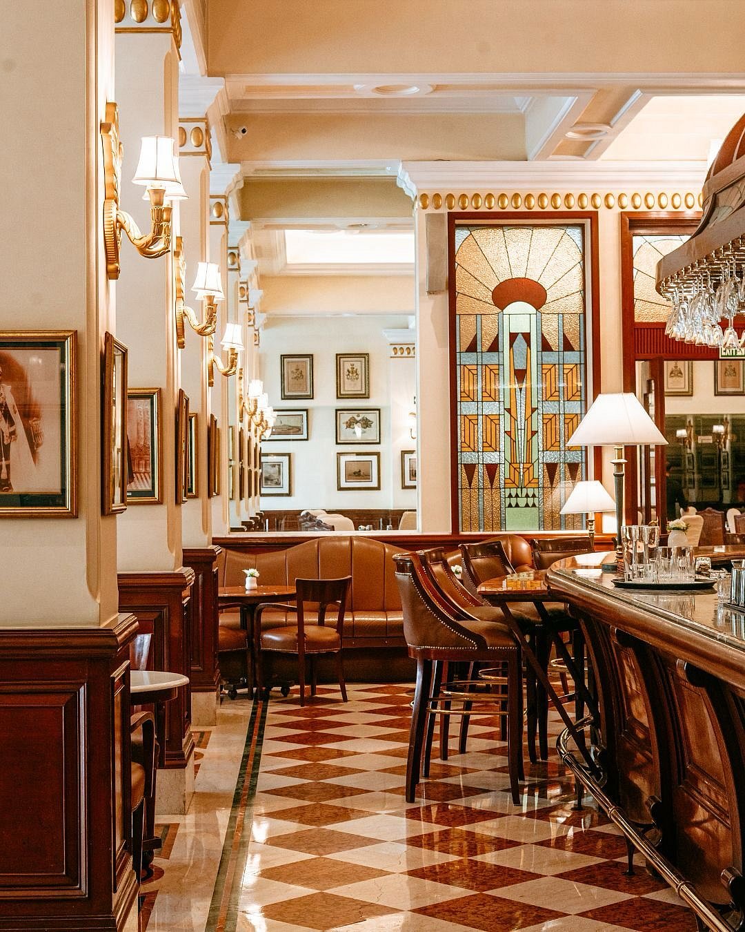 Paintings, lithographs, and historical maps appear throughout the property.