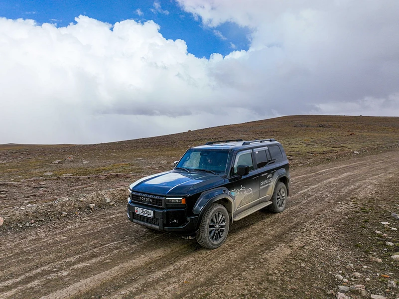 Toyota Land Cruiser on a rugged dirt road