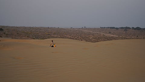 The sea of sand whispers tranquility