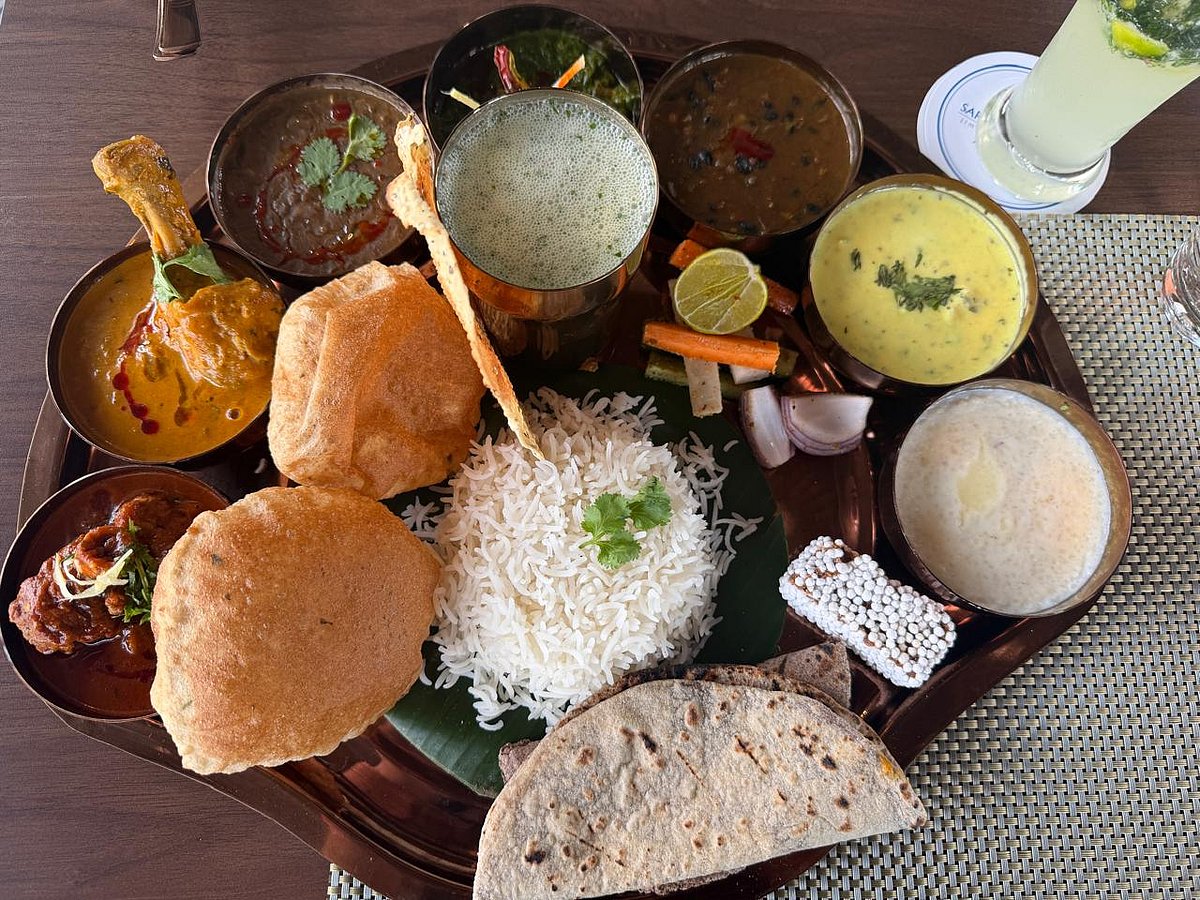 Regional thali spread at Brahmkamal, Vandhara Sarovar Premiere, Patkote