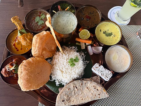 Regional thali spread at Brahmkamal, Vandhara Sarovar Premiere, Patkote