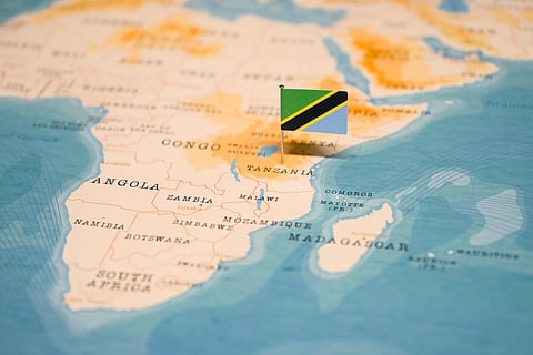 A map and flag representing Tanzania
