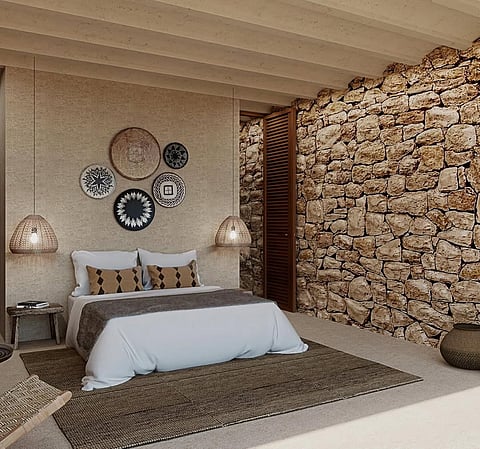 Rooms open out onto terraces, with the sea and cliffs never far from view