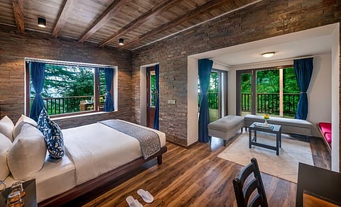 Eagles Nest Dharamshala houses 20 rooms and suites, each room opening up to the Dhauladhar range