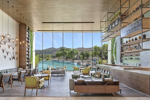 The resort features spacious rooms and suites, many opening out to river or forest views