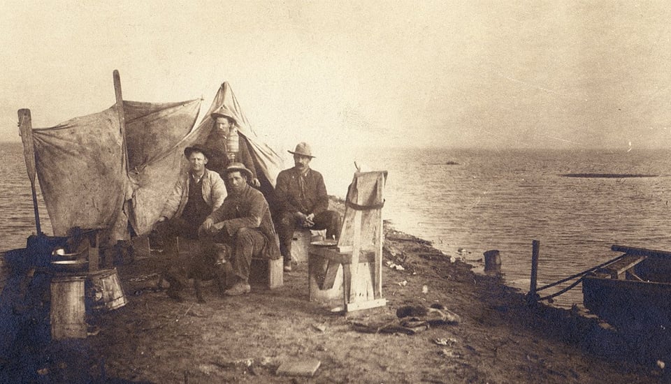 A group of men camping at the shores of Tulare Lake, 1880