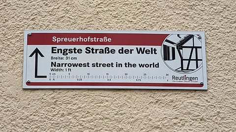 Visitors often need to turn sideways to pass through the street comfortably
