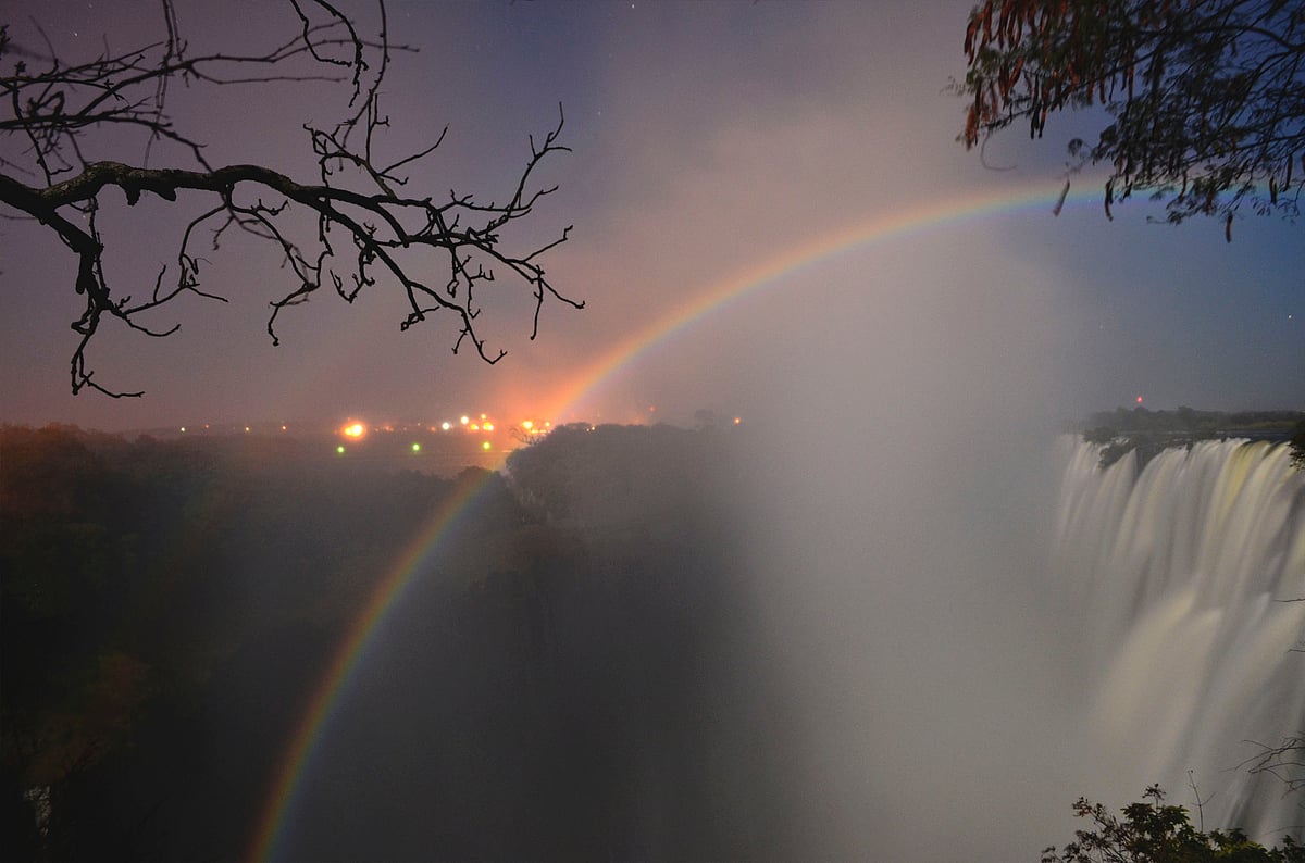 A lunar rainbow illuminates Victoria Falls on the Zambia–Zimbabwe border