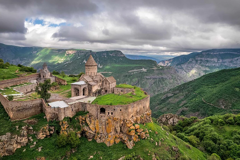 Tatev Monastery stands dramatically above the Vorotan Gorge in southern Armenia - Shutterstock