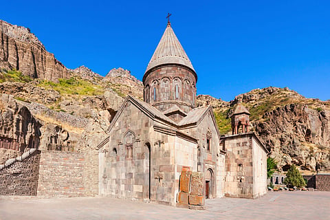 Geghard Monastery is partly carved into the cliffs of the Azat River Gorge
