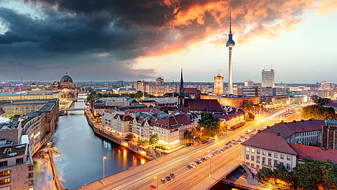 A panoramic evening view captures the vibrant energy of Berlin