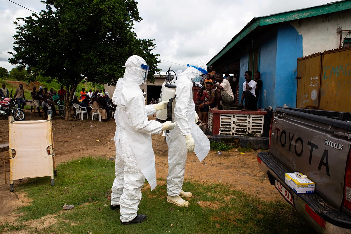 Shutterstock : (Representational Image) Health workers prepare for an Ebola response operation in West Africa