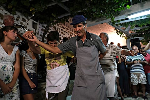 Traditional dancing remains central to island life in Greece