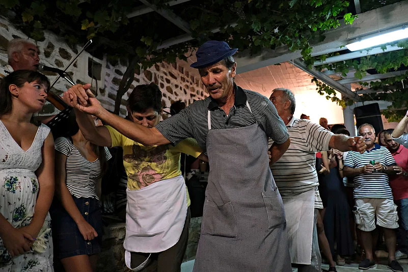 Traditional dancing remains central to island life in Greece