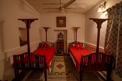The property has 20 rooms, eight of them former stables with thick stone walls that manage the Rajasthan heat with a composure no air conditioning could replicate.