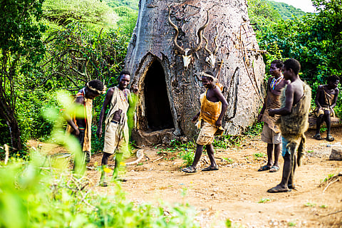 Members of the Hadzabe tribe around home in Karatu, Tanzania