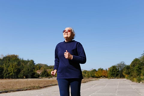 An elderly woman embraces a healthy lifestyle
