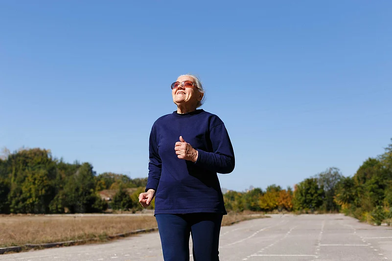 An elderly woman embraces a healthy lifestyle