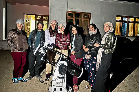 Guests at Tsering Dolker's homestay gather for a stargazing session in Hanle