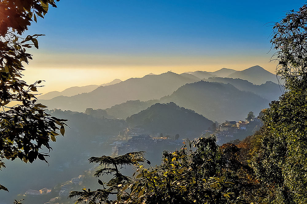 Shutterstock : Misty forests blanket the hills of Mussoorie and Landour
