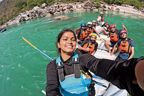 Priyanka Rana guides a raft through Ganga's rapids