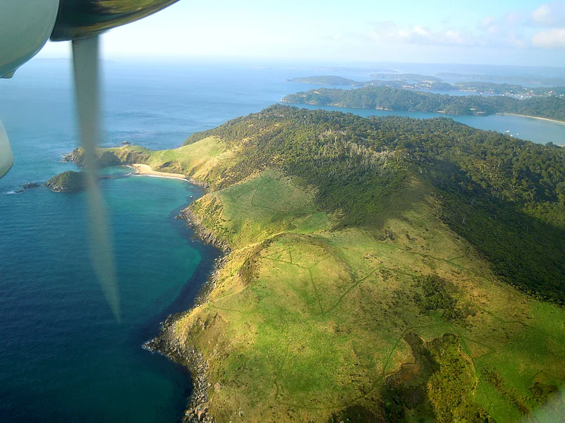A view from the window on a plane of Stewart Island in New Zealand