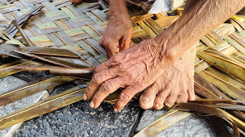 Making roofing panels with coconut leaves