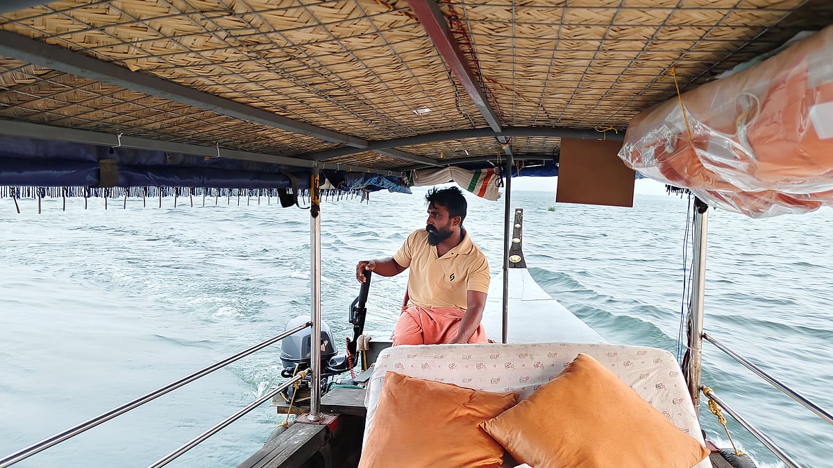 The boatsman gave us a tour of the Vembanad Lake