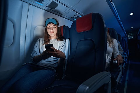 A woman on a night flight