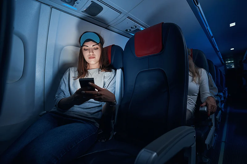 A woman on a night flight