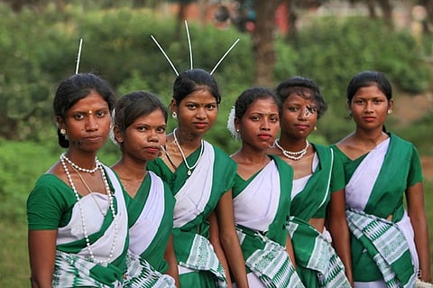 Members of the Oraon community, one of Jharkhand's largest Adivasi groups and the primary speakers of the Kurukh language.