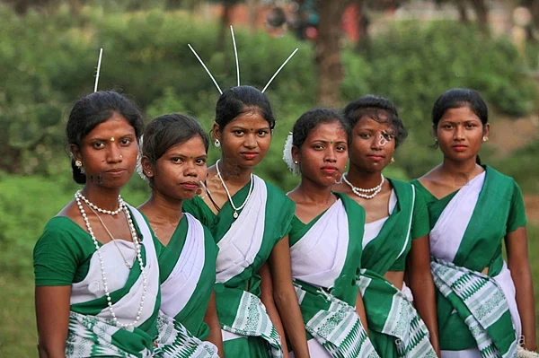 Members of the Oraon community, one of Jharkhands largest Adivasi groups and the primary speakers of the Kurukh language.