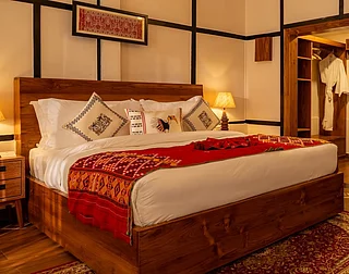 kaziranga_heritage/Instagram : Rooms have handcrafted Assamese details and soaring ceilings