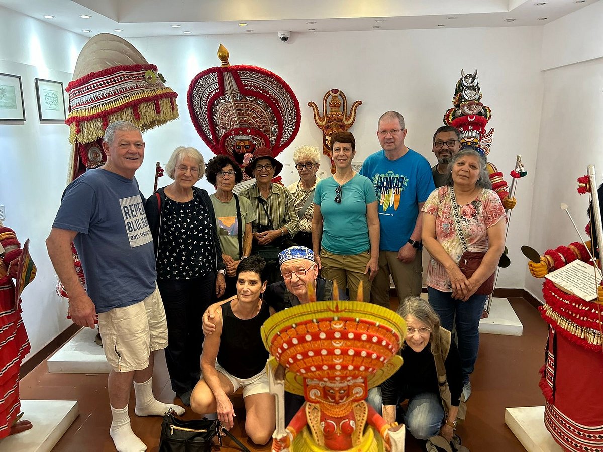 Tourists with Theyyam performers 