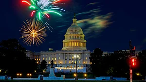 Shutterstock : Fireworks light up the sky above the US Capitol during Fourth of July celebrations in Washington, DC