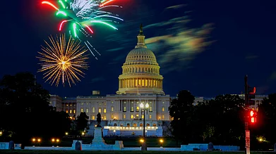Shutterstock : Fireworks light up the sky above the US Capitol during Fourth of July celebrations in Washington, DC