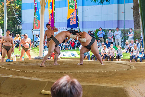 Professional sumo wrestlers compete during a tournament in Iwate, Japan