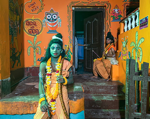 Children in the roles of Ram and Lakshman prepare to perform in the winding lanes of Puri's historic Sahis
