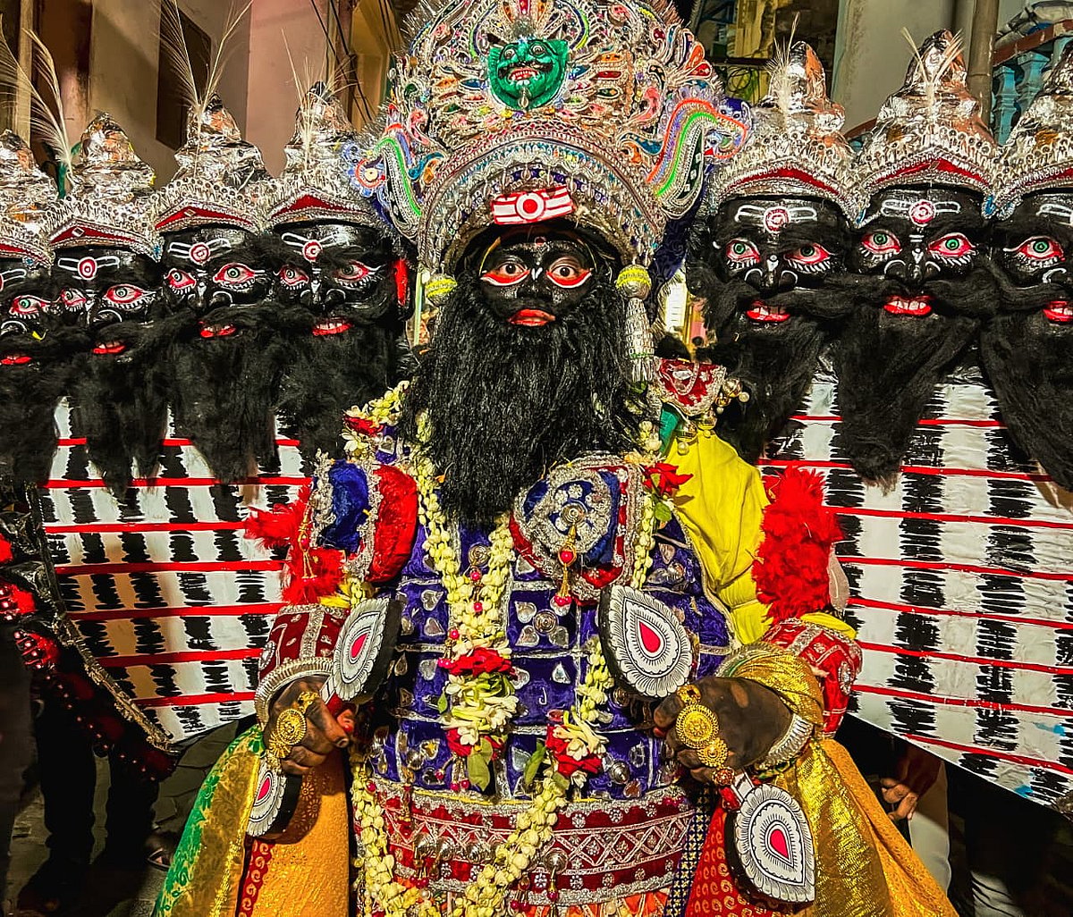 Men dress as evil Ravan, who during these 15 days of Sahi Jata, roams on the streets throughout the day and on the last day, he visits the Jagannath Temple to seek his blessings