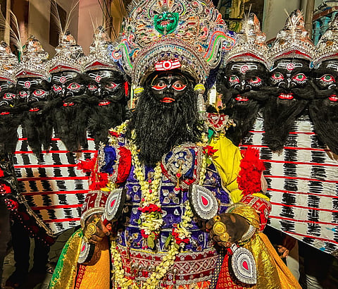 Men dress as evil Ravan, who during these 15 days of Sahi Jata, roams on the streets throughout the day and on the last day, he visits the Jagannath Temple to seek his blessings