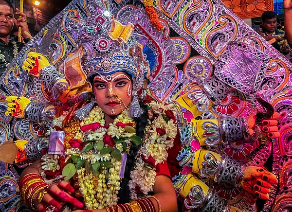 Debmalya Das : Dashabujha Durga Medho where young girls get dressed as Goddess Durga and perform on the streets
