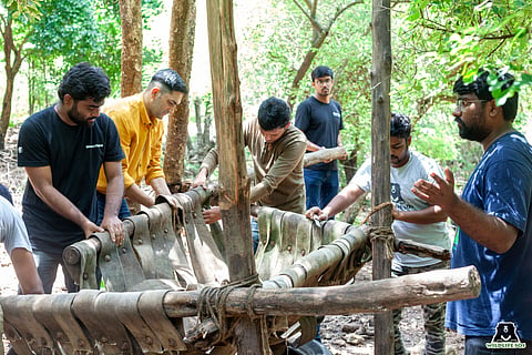 Volunteers making hammock enrichment for bears at BBRC