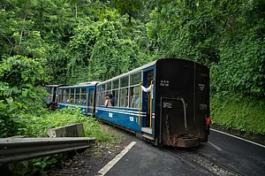 Shutterstock : The iconic Darjeeling Himalayan Railway winds through the hills of West Bengal